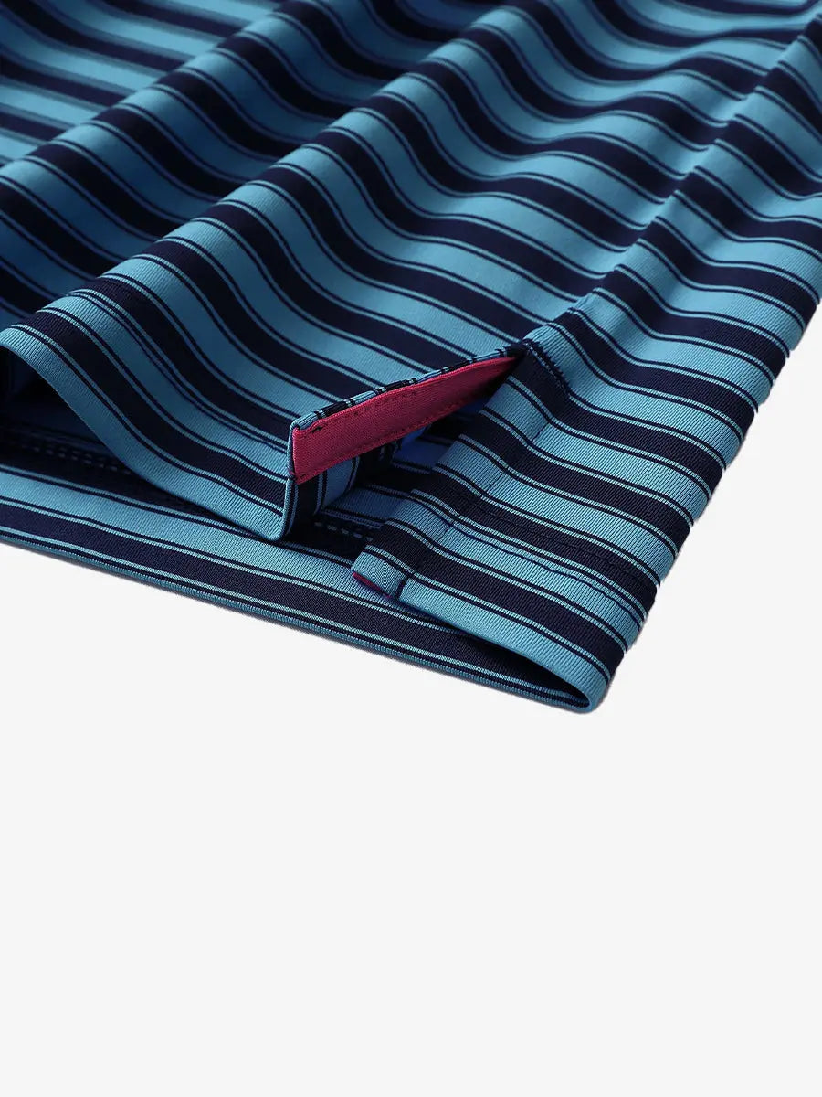 Close-up of the hem slit on the Navy Blue Yarn Dyed Stripe Polo – detailed and clean finish