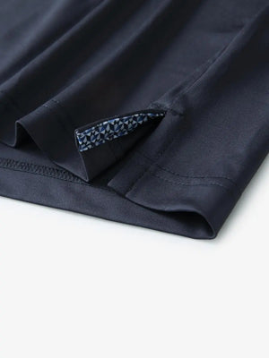 Close-up of side slit detail on the Dark Grey Everyday Classic Solid Polo hem