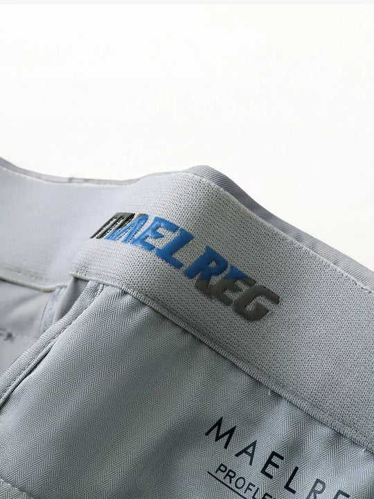 LIGHT GREY Water Resistant Everyday Pants close-up of waistband inner logo detail