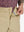Close-up of waistband button and interior logo on KHAKI Water Resistant Versatile 8 Pockets Shorts.