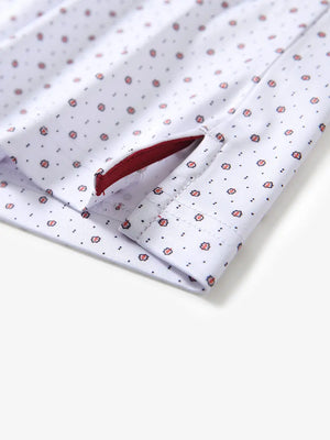 Hem slit detail of WHITE GEO Performance Quick Dry Print Golf Polo highlighting stitching and finish