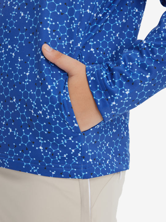 Model with both hands in pockets wearing youth full print stylish hoodies pullover in blue molecular structure.