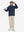 Full body model holding a golf club, styled in youth winter micro-fleece quarter zip pullover with navy