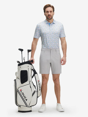Full-body front view of model wearing the colorful wine glass 4 way stretch print collared polo shirt, showing the complete outfit