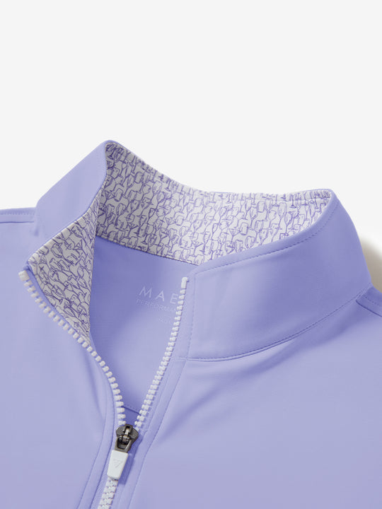 Zipper and inner pattern detail of the print collar quarter zip golf vest in lavender, highlighting design.