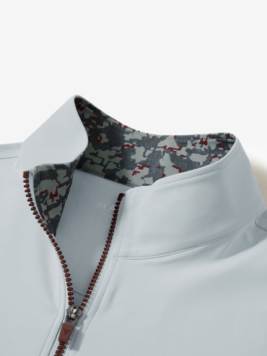 Zipper and inner pattern detail of the print collar quarter zip golf vest in misty grey, highlighting design.
