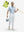 Full-body front view of model wearing the light blue line leaf 4 way stretch print collared polo shirt, showing the complete outfit