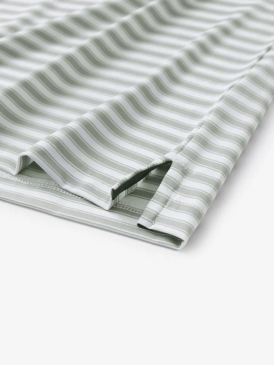 Close-up of the hem slit on the Grey White Yarn Dyed Stripe Polo – functional and stylish
