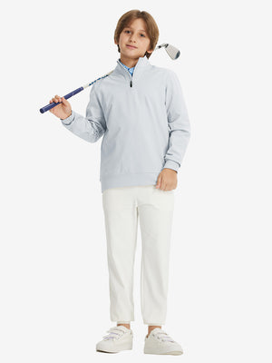 Full body model holding a golf club, styled in youth winter micro-fleece quarter zip pullover with misty grey