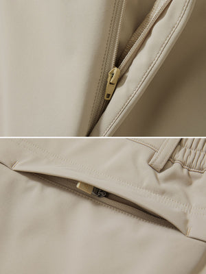 Zipper detail shot of light khaki thermal water repellent fleece dress pants