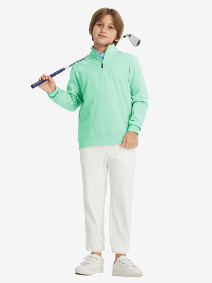Full body model holding a golf club, styled in youth winter micro-fleece quarter zip pullover with turquoise