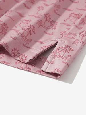 Detail: hem slit of pink beach palm stretch printed collarless henley golf shirts