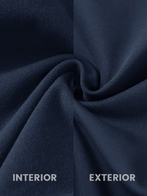 Close-up of the inner and outer fabric of women's stretch fleece lined water resistant joggers in navy, showing fleece lining and exterior.