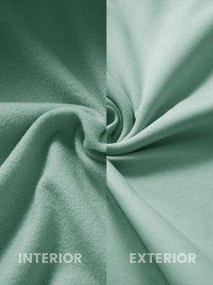 Inside and outer fabric close-up of dusty green youth winter micro-fleece quarter zip pullover, soft fleece.