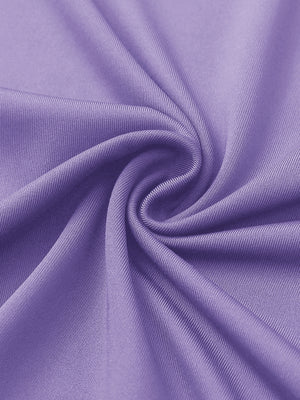 Close-up of lilac women's performance solid polo fabric texture.