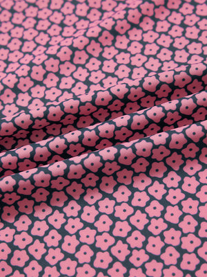 Full print lightweight quarter zip pullover, close-up of smooth fabric with detailed print in red navy flower