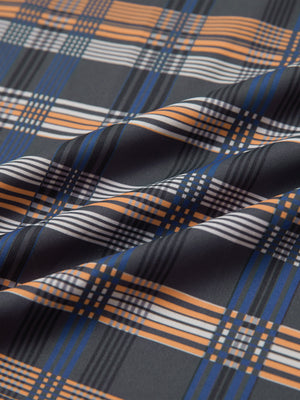 Full print lightweight quarter zip pullover, close-up of smooth fabric with detailed print in blue/white/yellow plaid