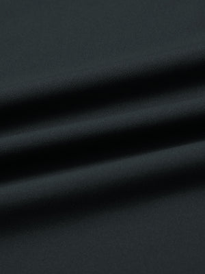 Fabric close-up of print collar quarter zip golf vest, smooth material with subtle texture in dark grey