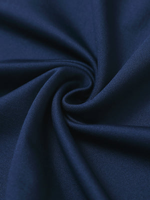 Fabric close-up of Stretch solid fleece quarter-zip vest with soft feel and navy detail