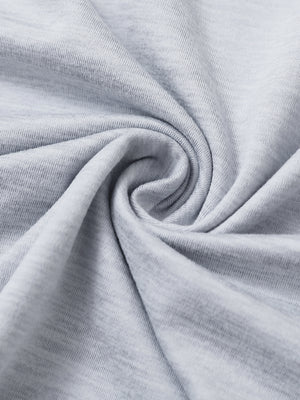 Close-up fabric view of athletic lightweight golf hoodies, breathable knit and smooth hand feel in faded denim heather