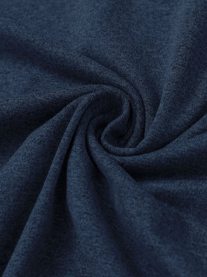 Fabric close-up of quarter zip hoodie with kangaroo pocket, soft texture and cozy feel in cobalt heather