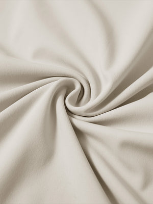 Fabric detail of youth long sleeve hoodied with kangaroo pocket, soft knit texture with khaki light tone
