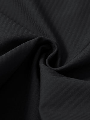 Close-up of fabric on lightweight flat front casual trousers, highlighting texture and finish in black.