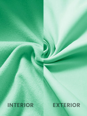 Inside and outer fabric close-up of turquoise youth winter micro-fleece quarter zip pullover, soft fleece.