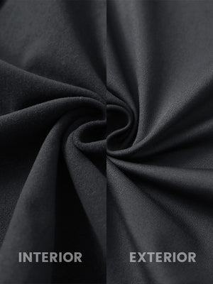 Close-up fabric detail of women's lightweight slim-fit puffer vest, smooth texture and black finish