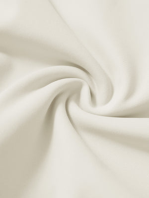 Fabric close-up of cream lightweight ankle-zip sweatpants with 4 pockets, breathable performance material.