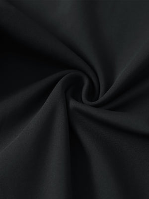 Close-up of ultra-stretch quick dry fabric used in black women's golf sweatpants