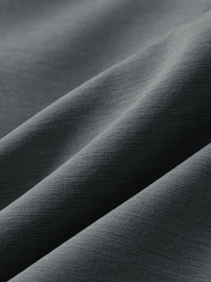 Close-up texture of iron grey flat front hybrid golf shorts fabric showing detailed hybrid material and weave.