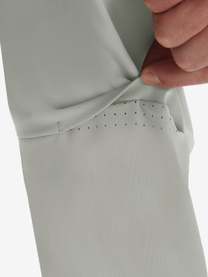 Detail view of design on silver gray flat front golf joggers pants with belt loops
