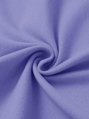 Fabric close-up of lavender women's water-resistant stretch fleece lined jacket, soft stretch fabric with fleece lining.
