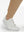 Detail view of hem on light khaki  flat front golf joggers pants with belt loops