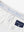 Detail view of inner waistband on white women's regular fit stretchy golf pants