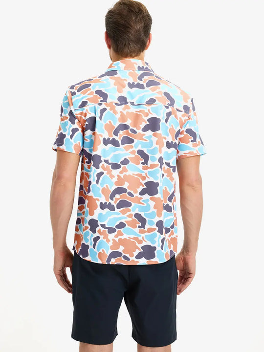 Full-body front view holding a takeaway drink cup, wearing BLUE ORANGE CAMO Stylish Printing Summer Shirt.