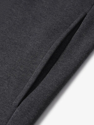 Close-up of right pocket on Dark Grey Heather hoodie highlighting function and fabric texture