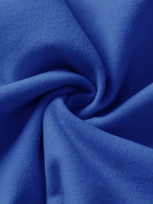 Fabric close-up of klein blue boys stretch fleece lined casual golf pants, soft stretch fabric with warm fleece lining.