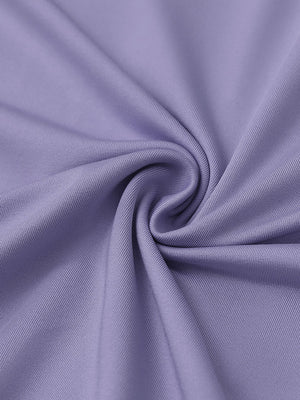Close-up of lavender everyday solid jersey polo fabric showing soft knit texture and smooth surface.