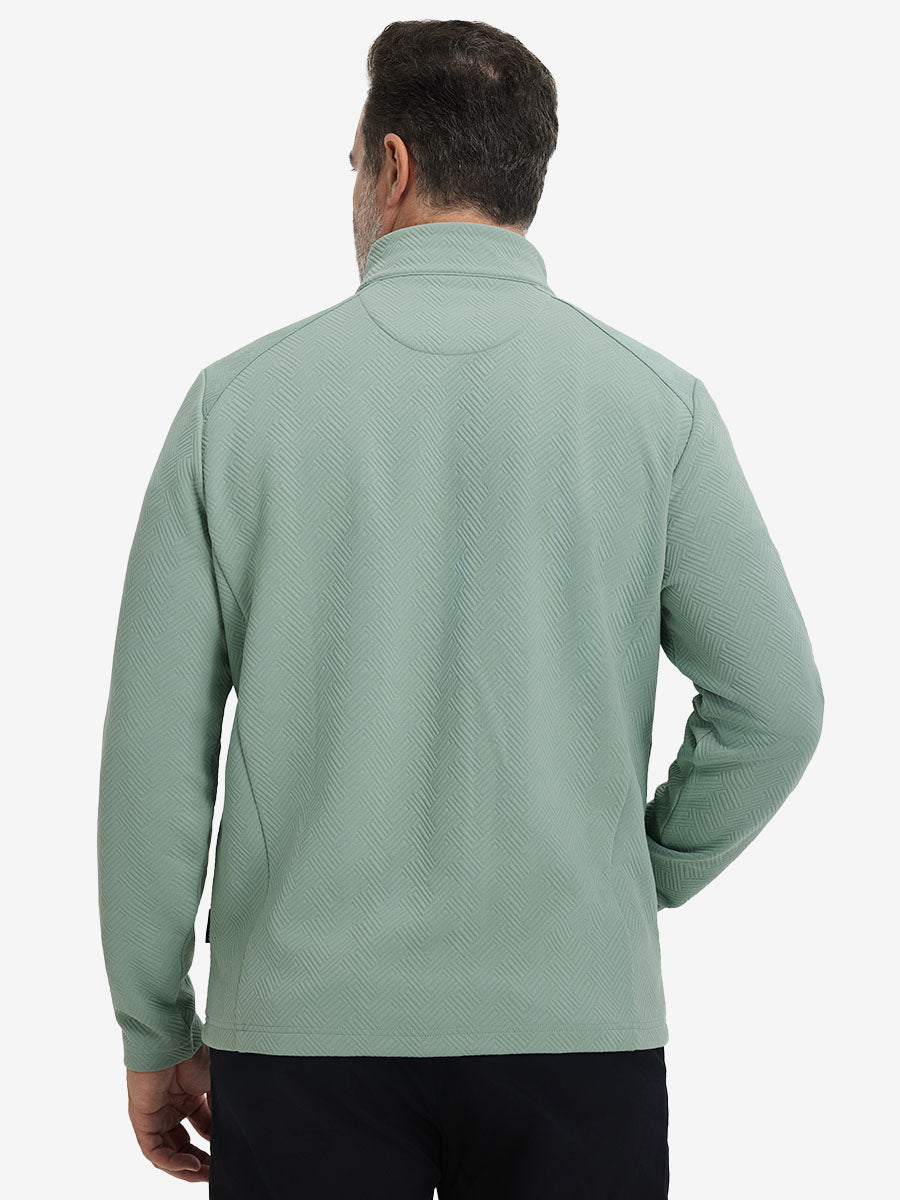 Back upper body view of model wearing textured insulated winter jacket, smooth finish, beryl green.