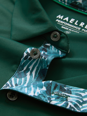 Detail of the collar opening on the blackish green everyday classic solid polo, emphasizing the structured neckline design