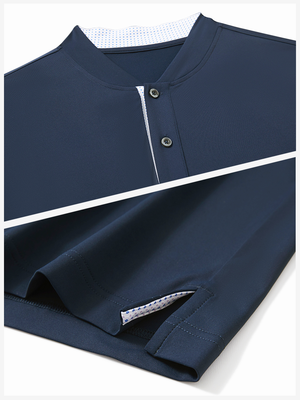 Detail of navy moisture-wicking short sleeve henley shirt showing collar and hem vent construction.