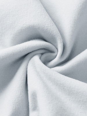 Fabric close-up of misty grey boys stretch fleece lined casual golf pants, soft stretch fabric with warm fleece lining.