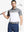 Half-body front shot holding golf club in WHITE Premium Performance Polo